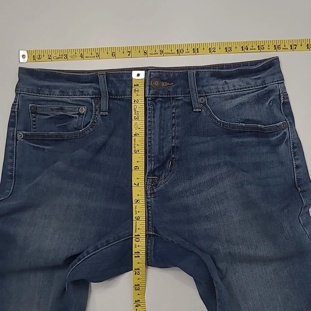 AE 360 Extreme Flex Jeans Straight Mid Wash Midi Waist Rise Whiskered Worn 31x32